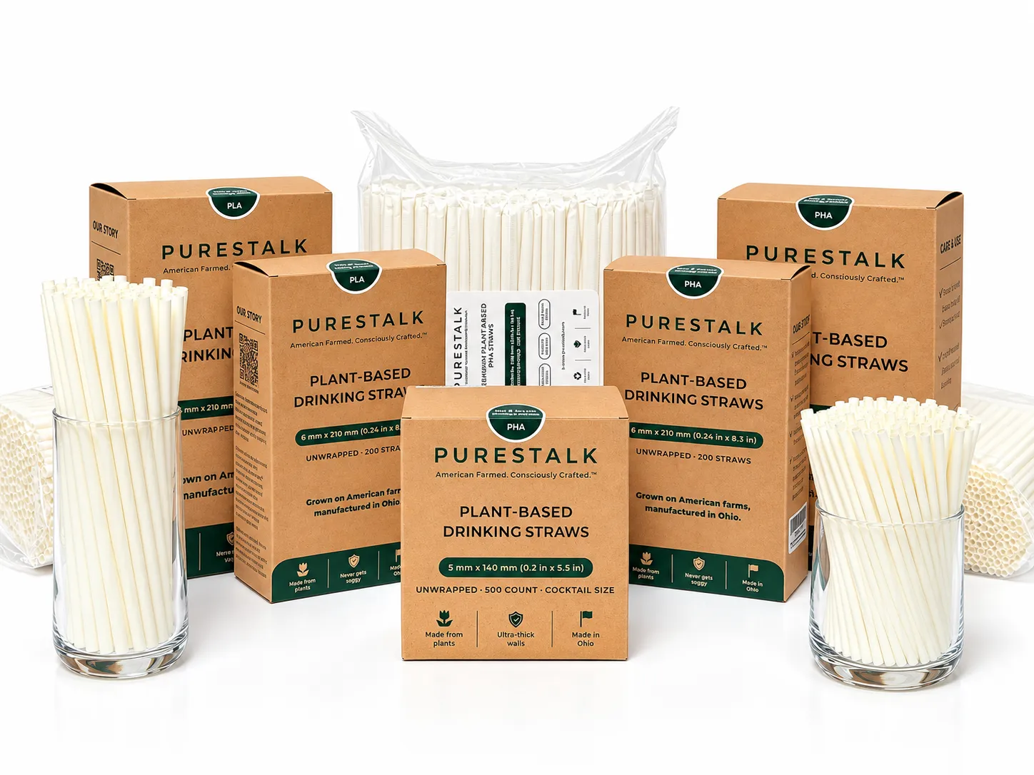 PureStalk plant-based PLA and PHA drinking straws in retail boxes and bulk packaging — multiple sizes, made in Ohio, USA